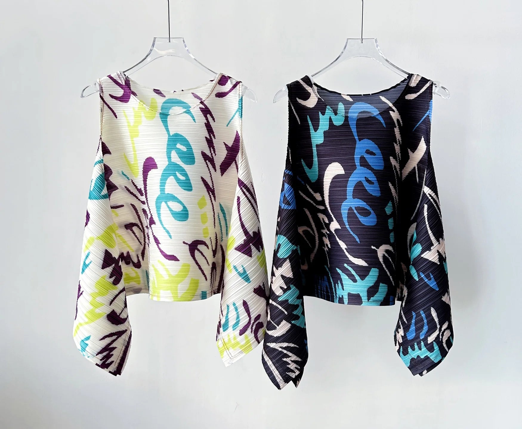 YUDX Vibrant Graffiti Print Miyake Pleated Asymmetric Sleeveless Top Lightweight Breathable Loose Fit Women's 2026 Summer Blouse
