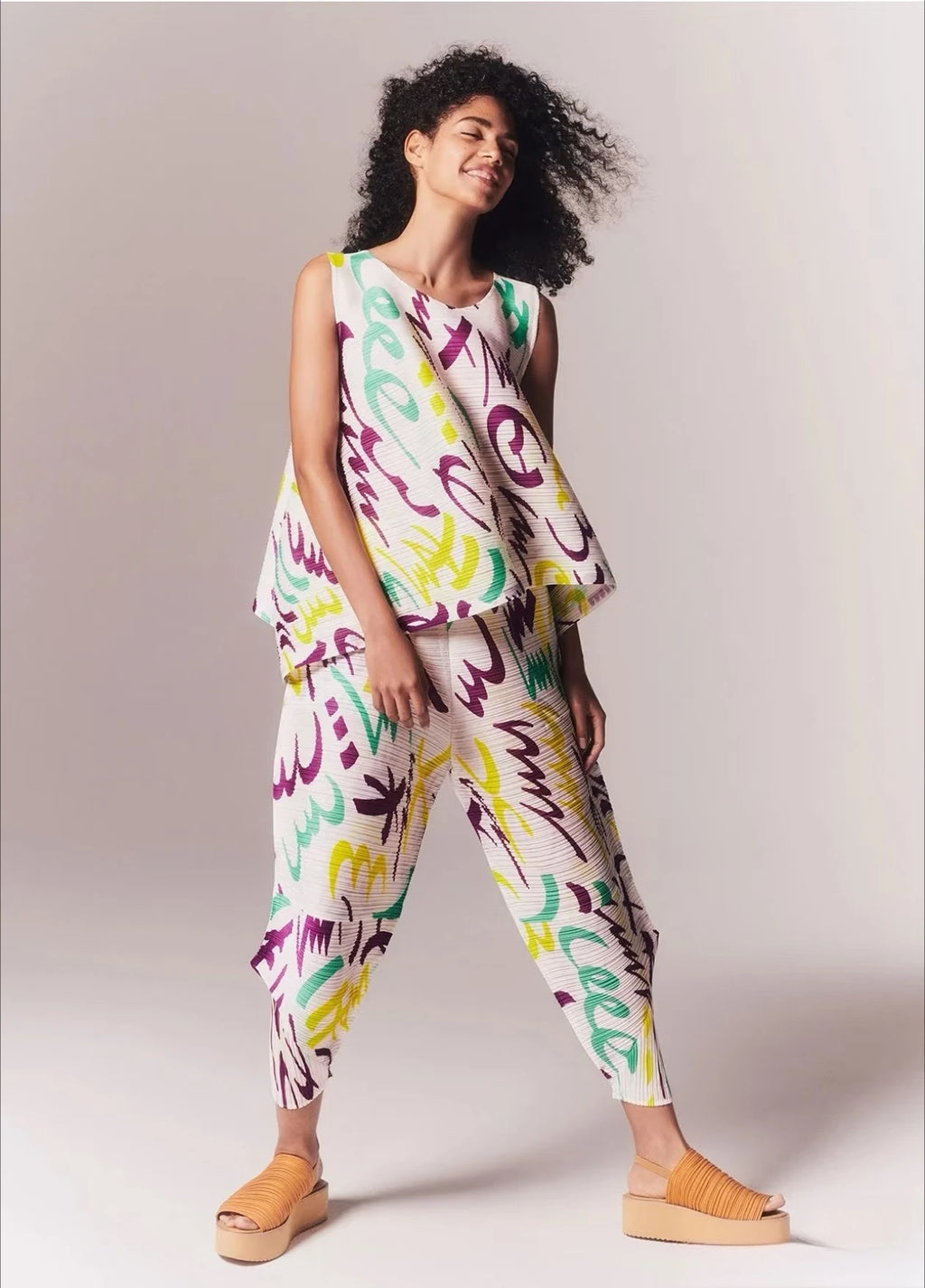 YUDX Vibrant Graffiti Print Miyake Pleated Asymmetric Sleeveless Top Lightweight Breathable Loose Fit Women's 2026 Summer Blouse